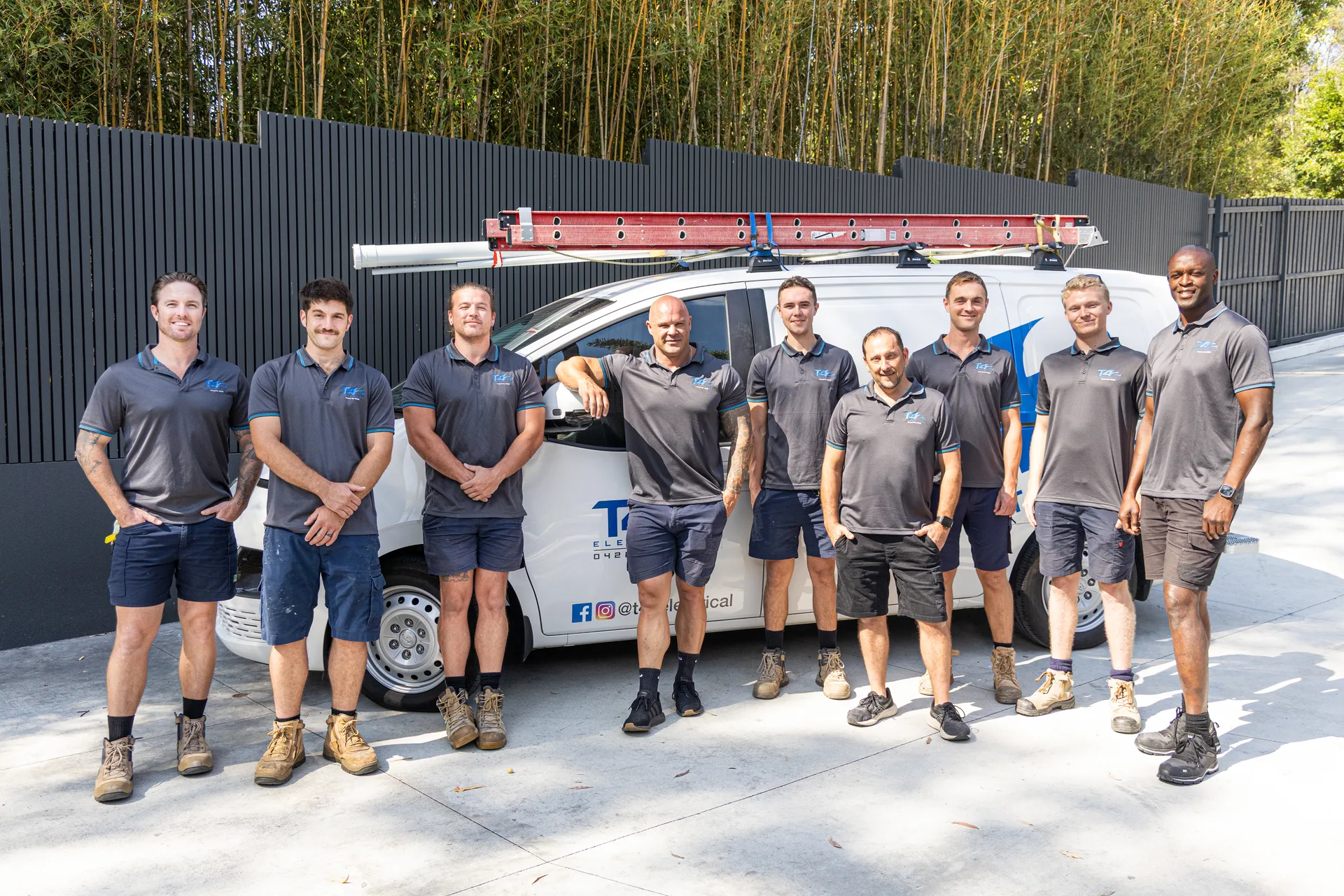 The Family Electrician Burleigh Heads team with a service van